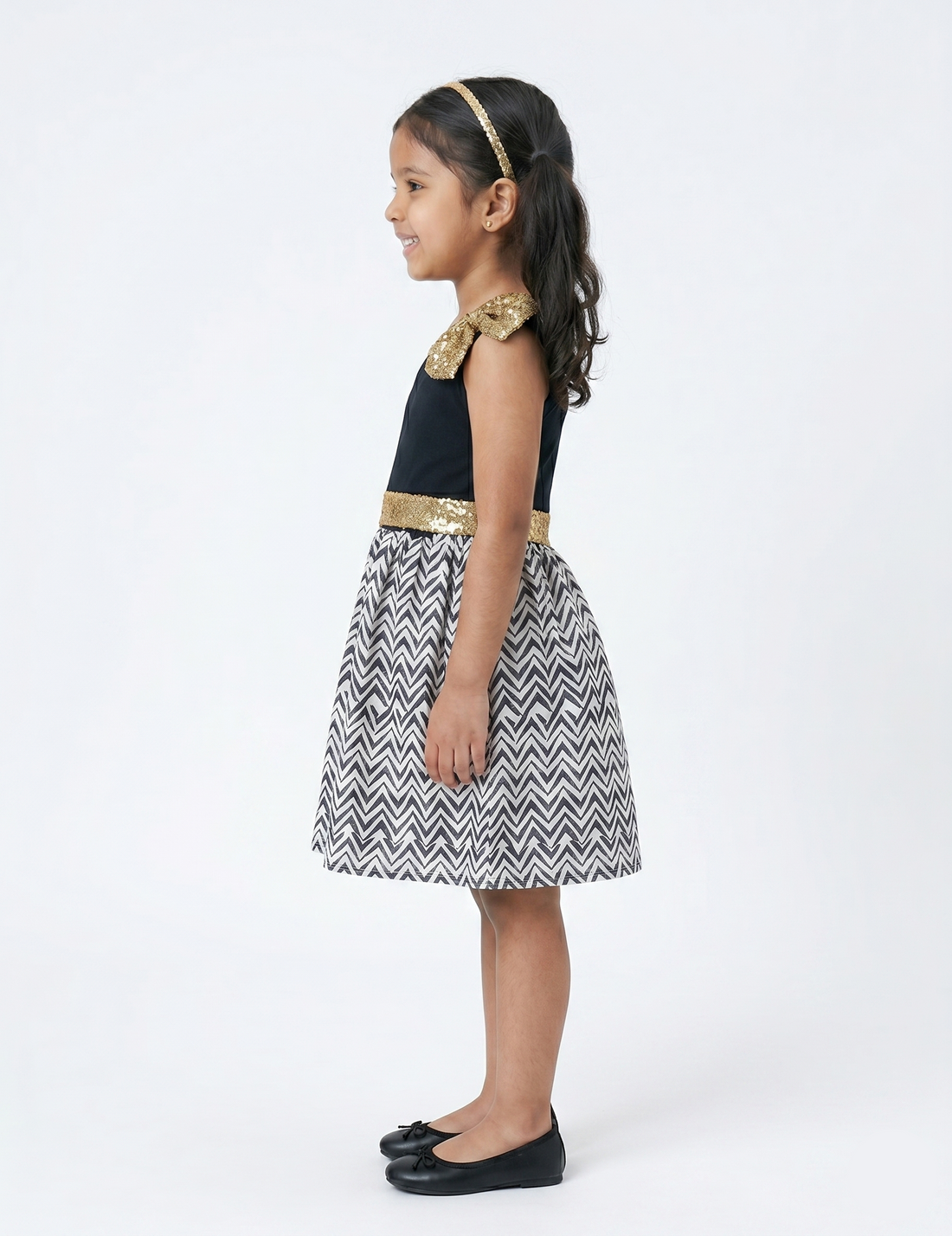 Girls' One-Shoulder Black Dress with Gold Sequin Bow and Chevron Skirt