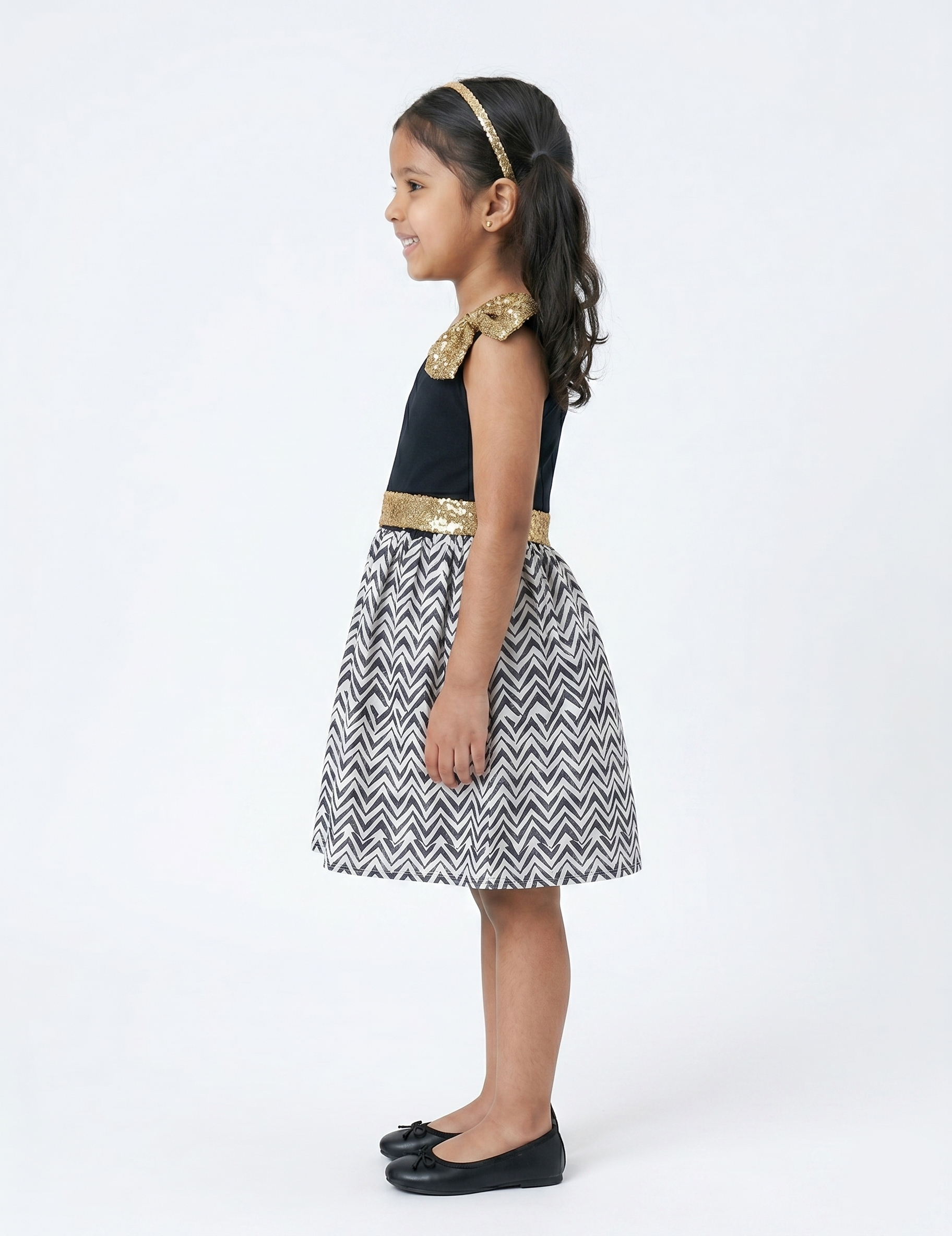 Girls' One-Shoulder Black Dress with Gold Sequin Bow and Chevron Skirt