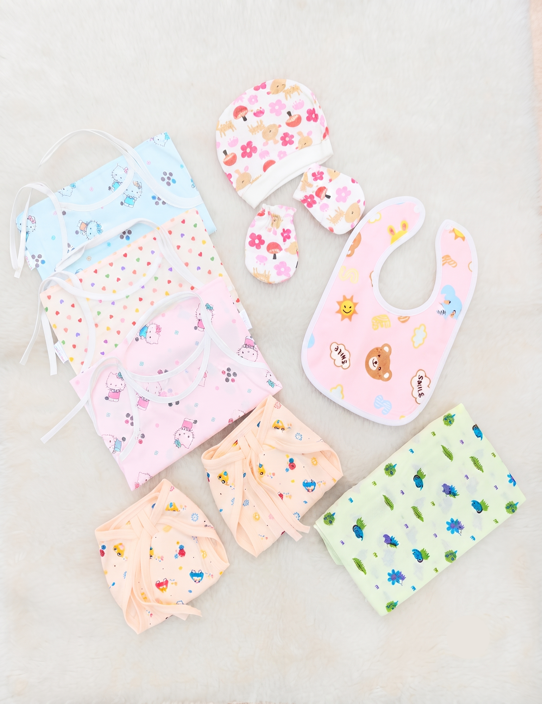 Newborn Baby Starter Kit: 9-Piece Clothing Bundle for Daily Comfort